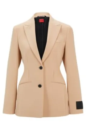 Single-breasted blazer in an hourglass silhouette